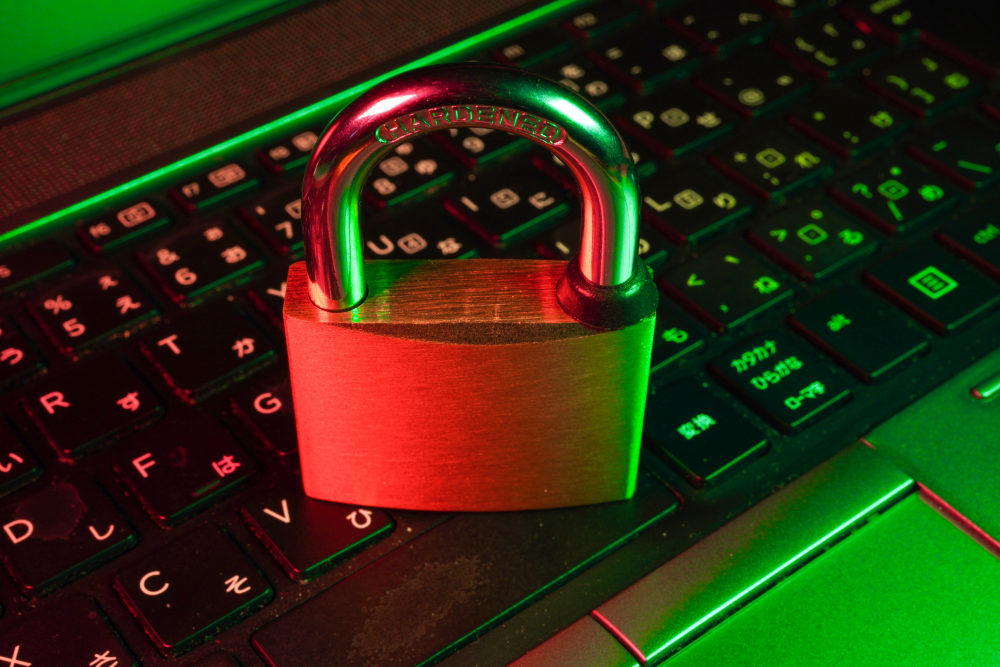 A computer keyboard with padlock on top
